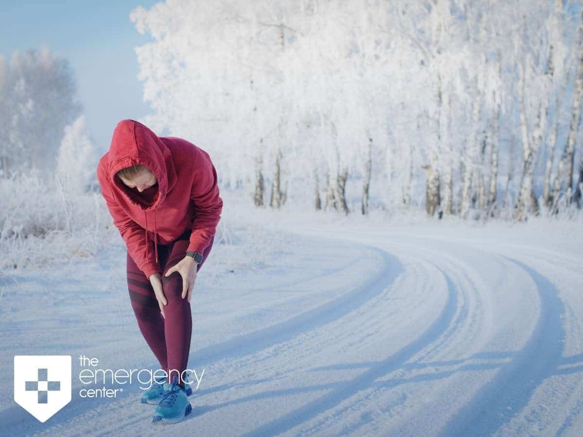 San Antonio Woman Suffering From A Knee Injury While Jogging Through An Icy Road In Texas